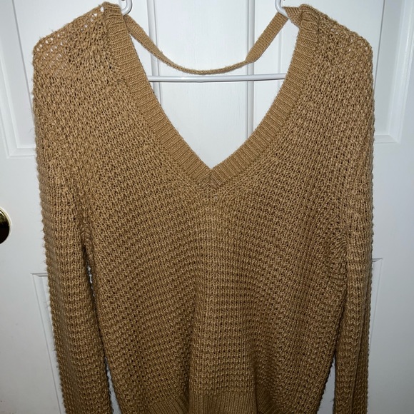 Long sweater could be worn as a dress or top depending on the person. - Picture 1 of 2